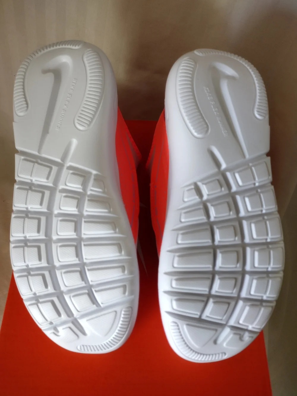 Nike Kids Slip-On Sneakers in White, Coral, Lavender